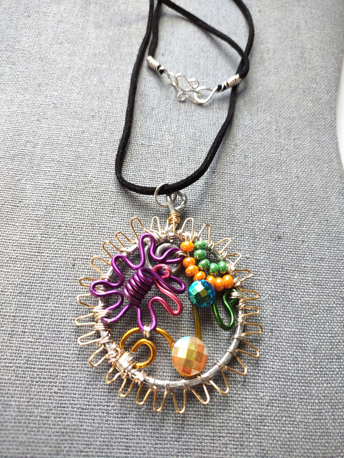 Aluminum Wearable Art Pendant – Sunburst Symphony