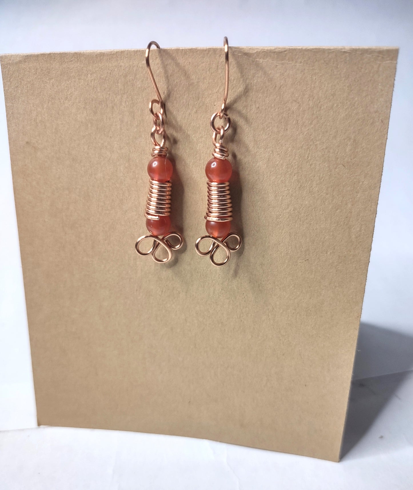Handmade Dangle Earrings with Carnelian Beads and coiled Copper wire