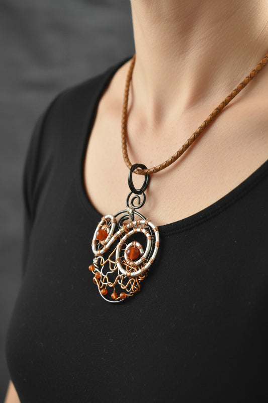 Jack -o-lantern - Aluminum and copper wire with carnelian beads.