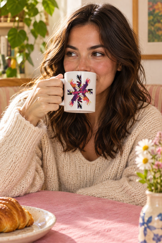 Colorful spin art on a white mug