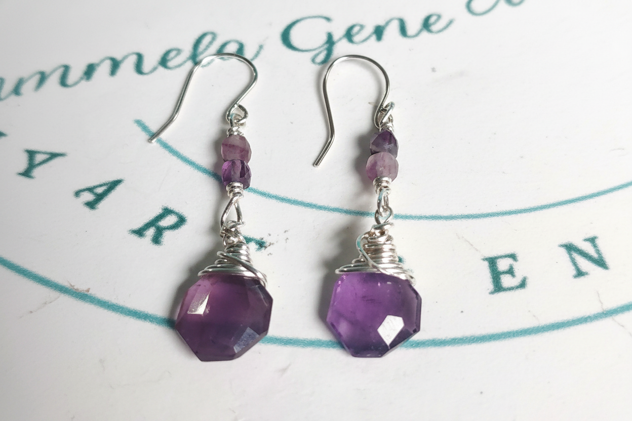 Sterling silver amethyst briolette earrings with enhanced lighting showing purple gemstone detail